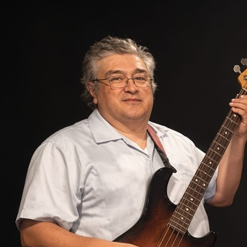 Portrait of Jaime on bass
